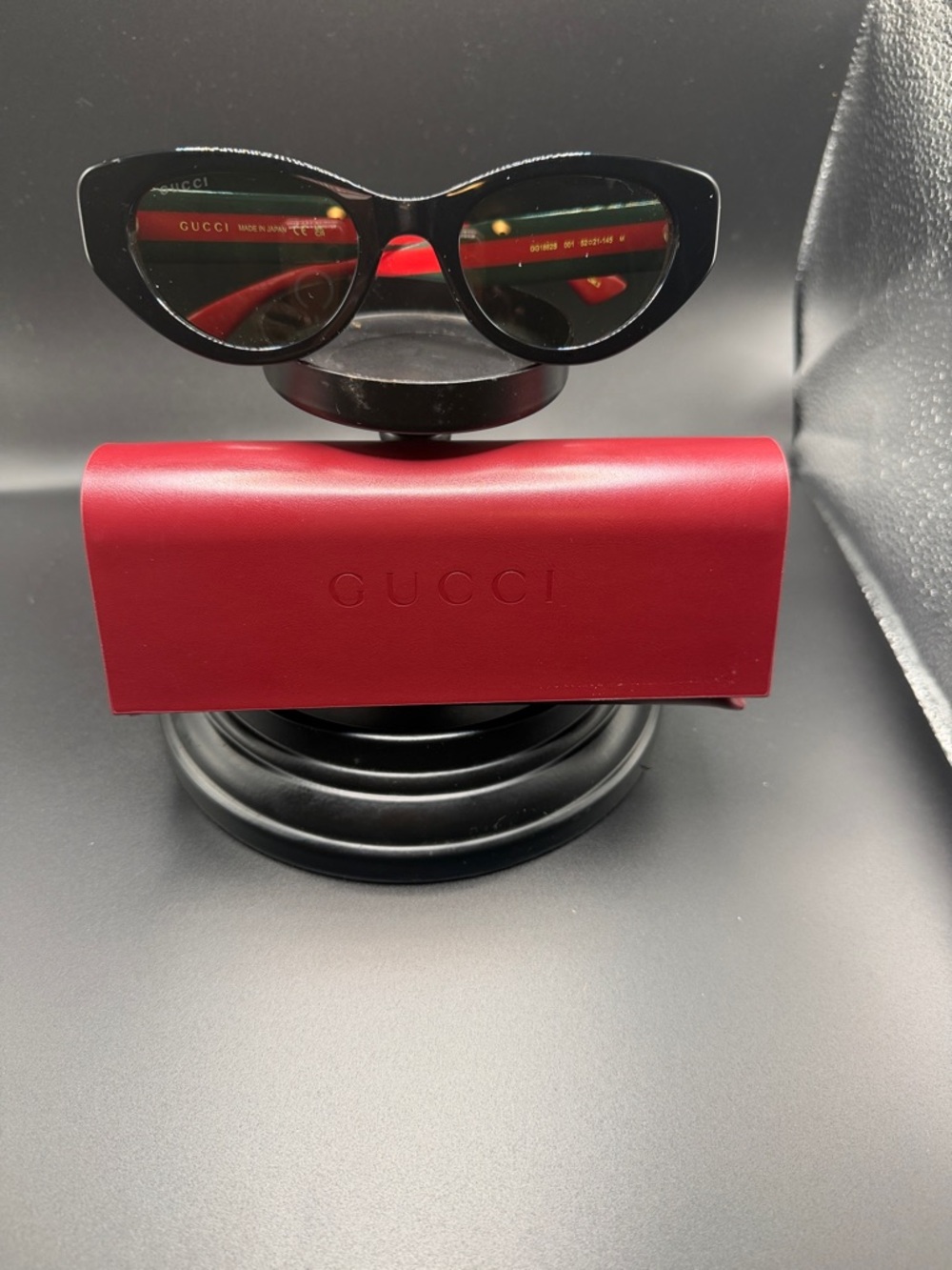 Gucci Black Cat-Eye Sunglasses with Red Case